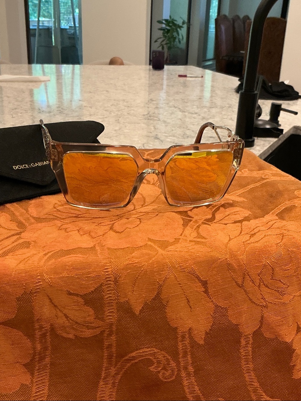 Dolce & Gabbana Clear Frame Sunglasses with Orange Lenses